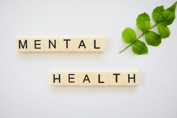 Notebook, tea, sunrise — mental health improvement plan concept