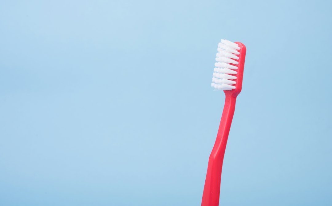 Gentle routine illustration for sensitive teeth care with soft-bristle brush and water