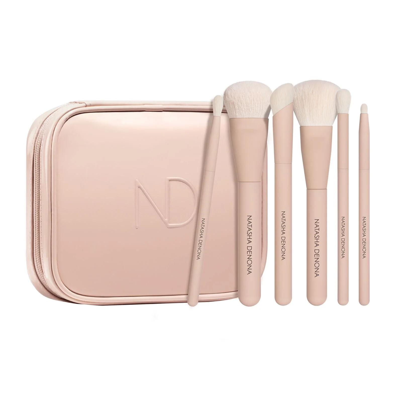 HY‑GLAM Brush Kit laid out beside palettes — tools for Natasha Denona eyeshadow application