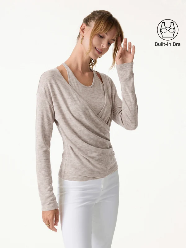 Layered surplice set from OGL apparel showing a top and pants
